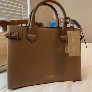 Beautiful Burberry bag. I paid $1800. Never used. Would like to get $1500.
